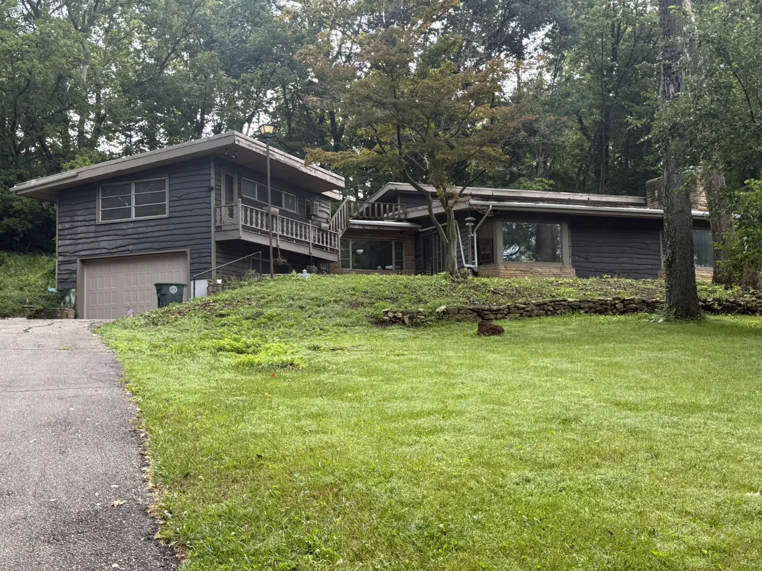Charcoal exterior of the house after renovation